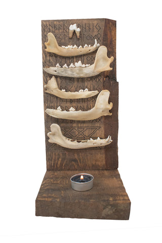 Image of stacked jawbones & elder futhark runes altar