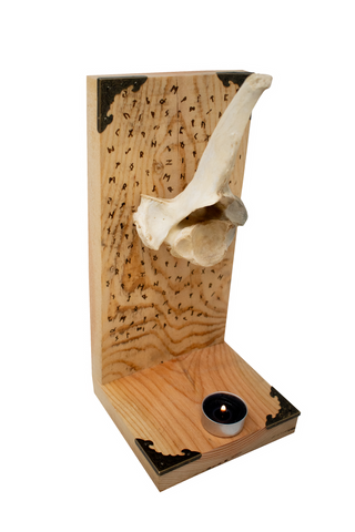 Image of runic cow vertebra altar