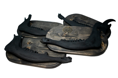 Image of viking ship petroglyph blackened elk jawbone hanger