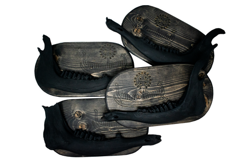 Image of viking ship petroglyph blackened elk jawbone hanger