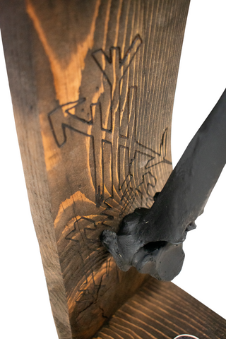 Image of protection bindrune and blackened elk vertebra altar