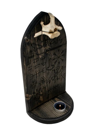 Image of norse symbols & deer vertebra altar