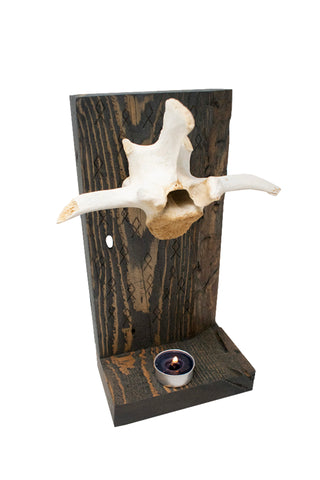 Image of Othala rune & elk vertebra altar