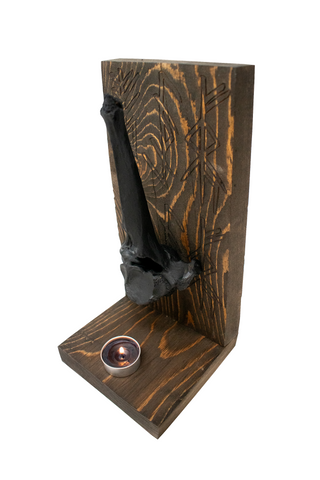 Image of triple bindrune and blackened elk vertebra altar