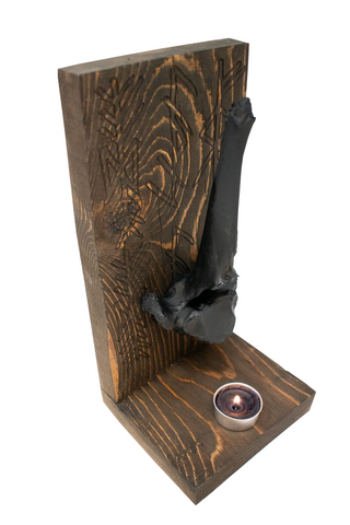 Image of triple bindrune and blackened elk vertebra altar