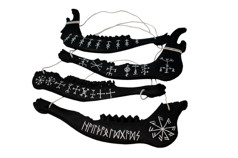 Image of blackened elk jawbone hanger