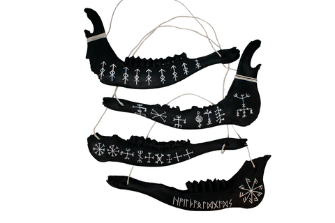 Image of blackened elk jawbone hanger