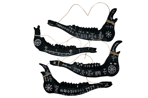 Image of blackened elk jawbone hanger