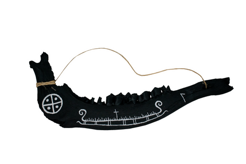 Image of blackened elk jawbone hanger