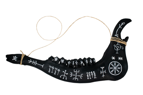 Image of blackened elk jawbone hanger