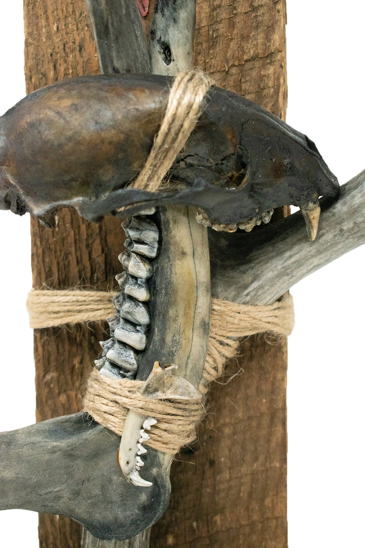 Blackened connection to the gods altar with bone sculpture
