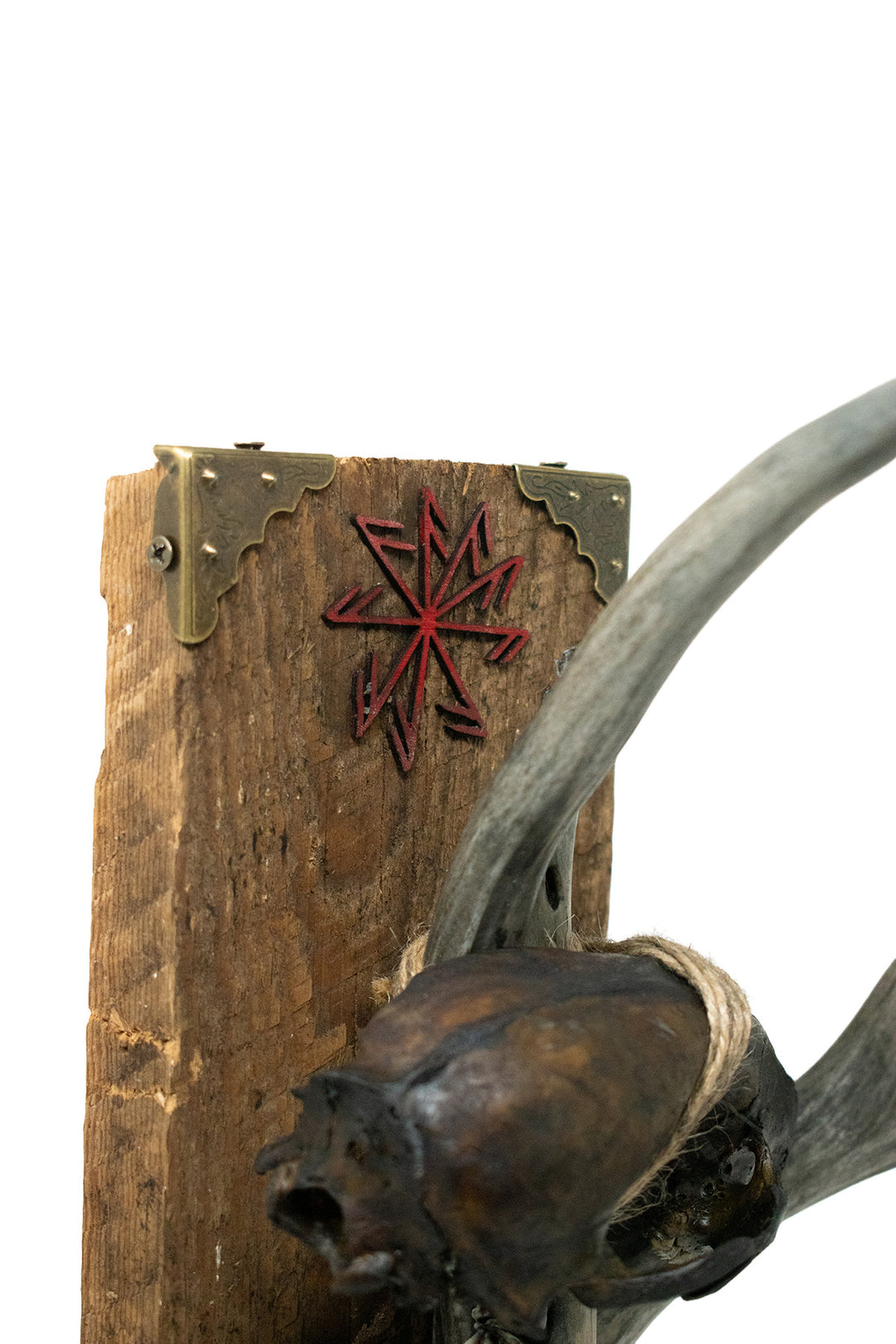 Blackened connection to the gods altar with bone sculpture