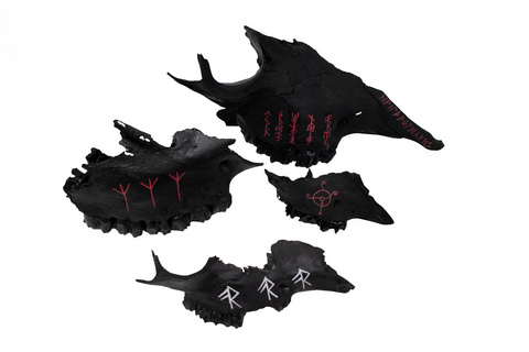 Image of blackened bone talismans
