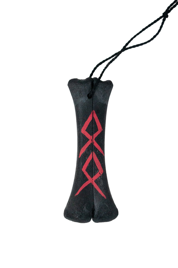 blackened ritual leg bone talismans