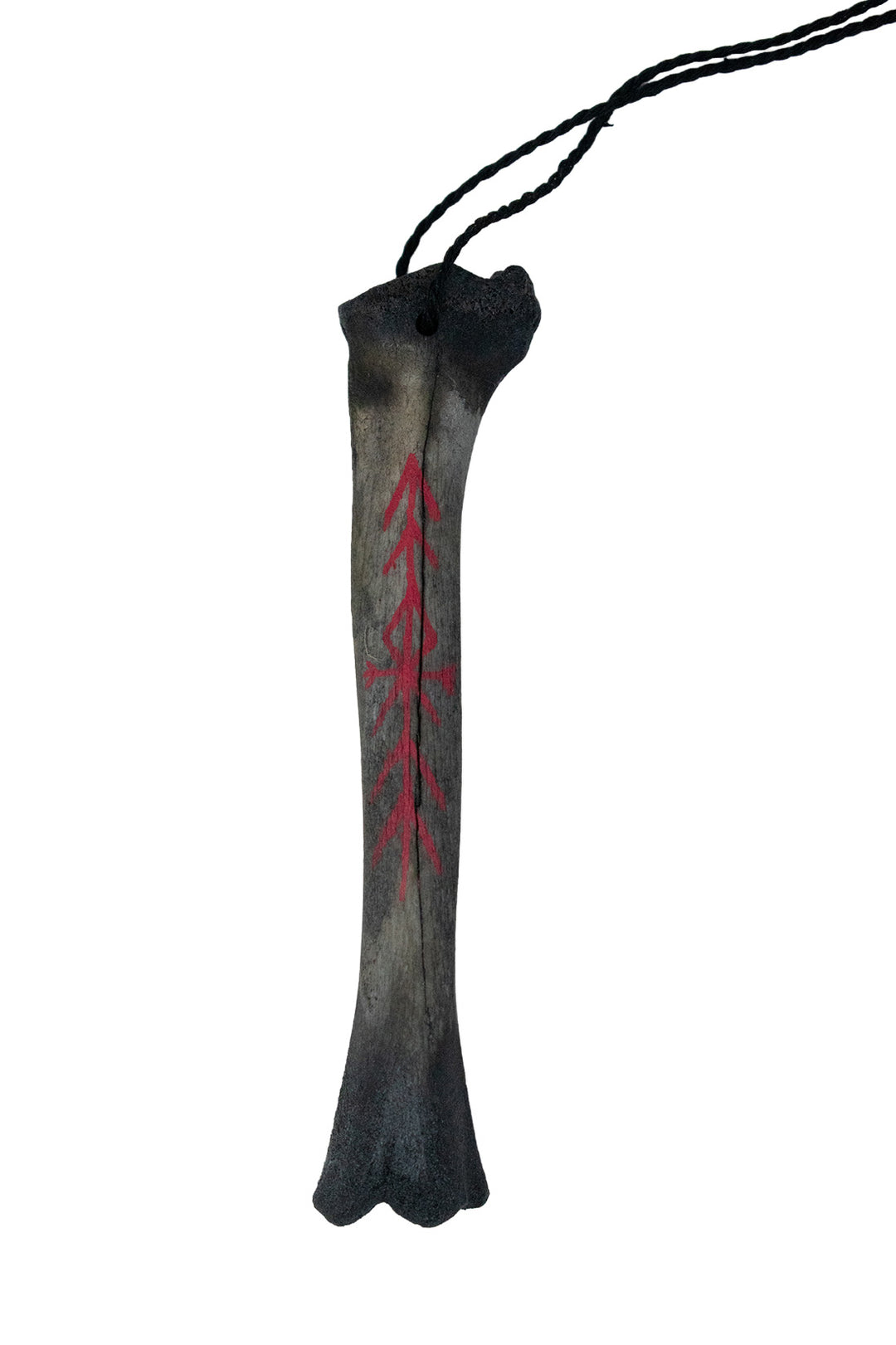 blackened ritual leg bone talismans