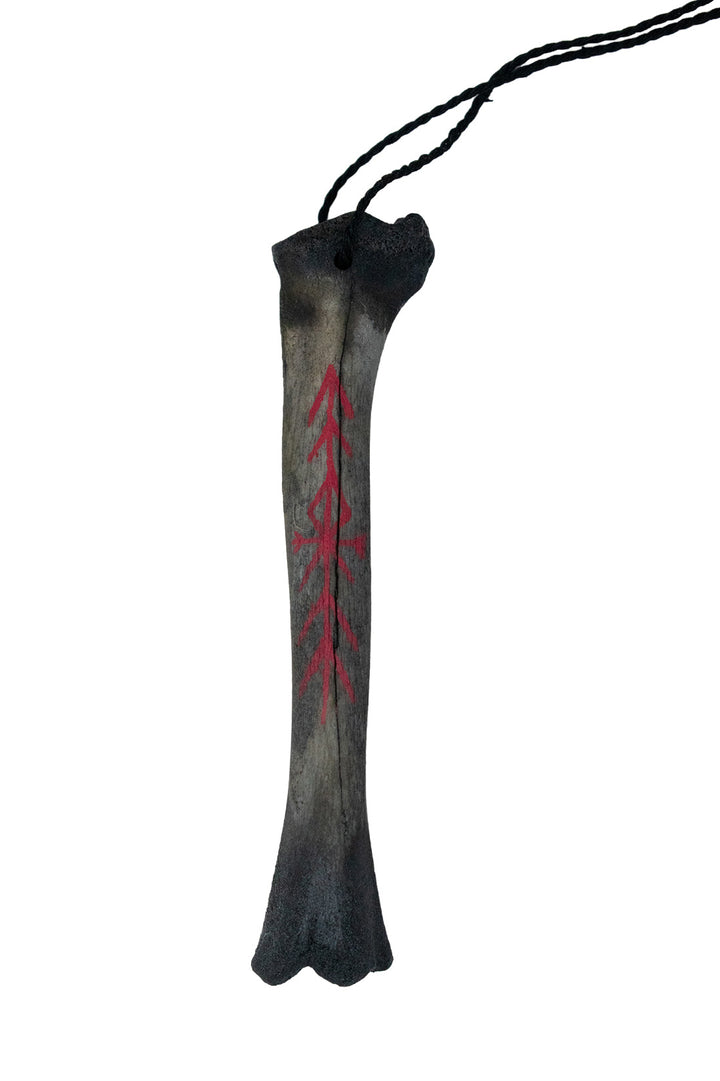 blackened ritual leg bone talismans
