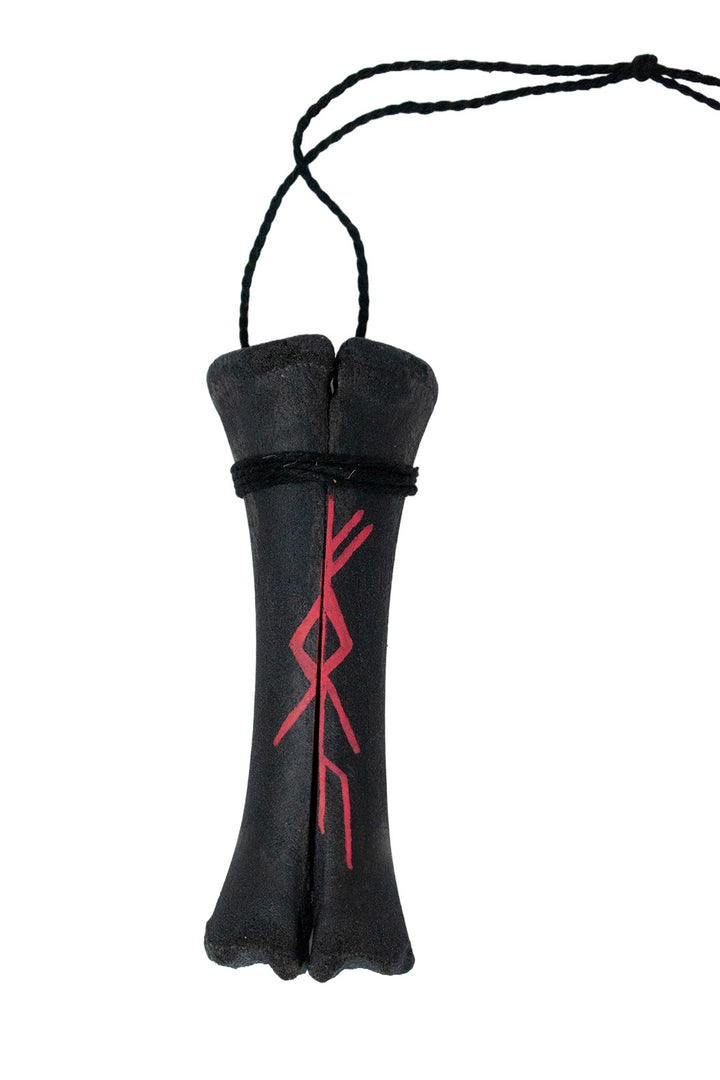 blackened ritual leg bone talismans