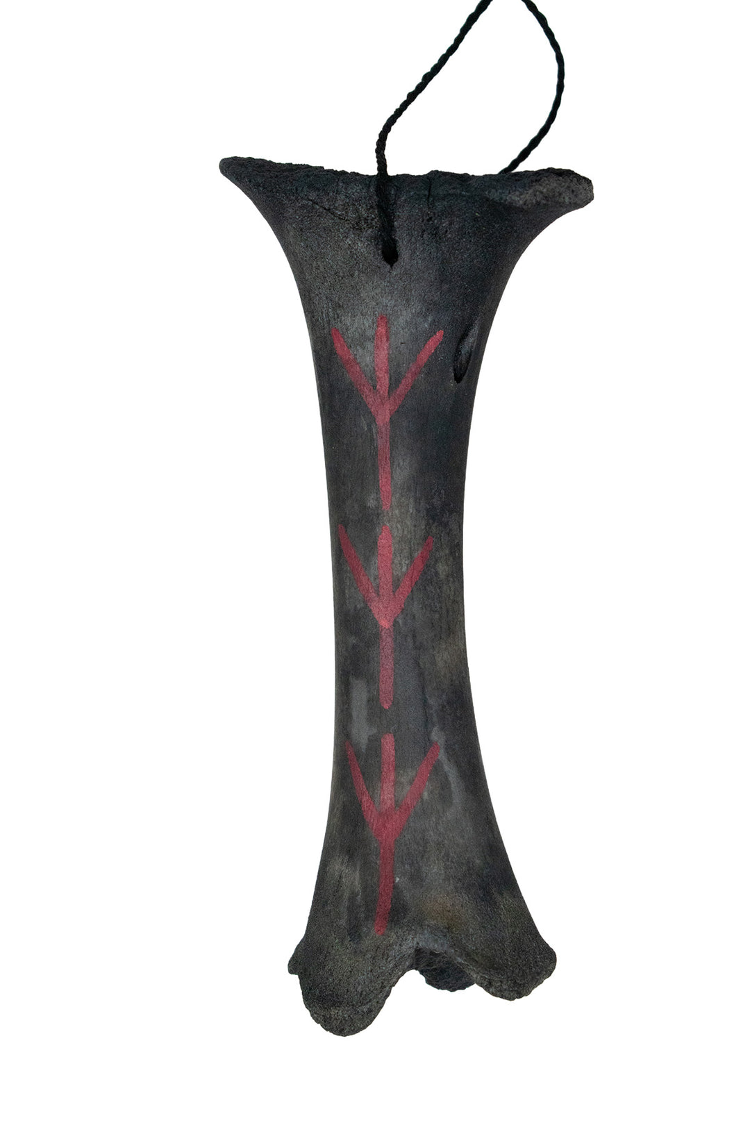 blackened ritual leg bone talismans