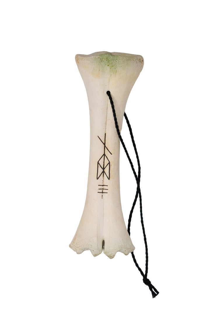 burned ritual leg bone talismans