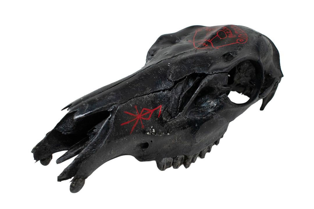 blackened elk skull loki snaptun stone altar piece
