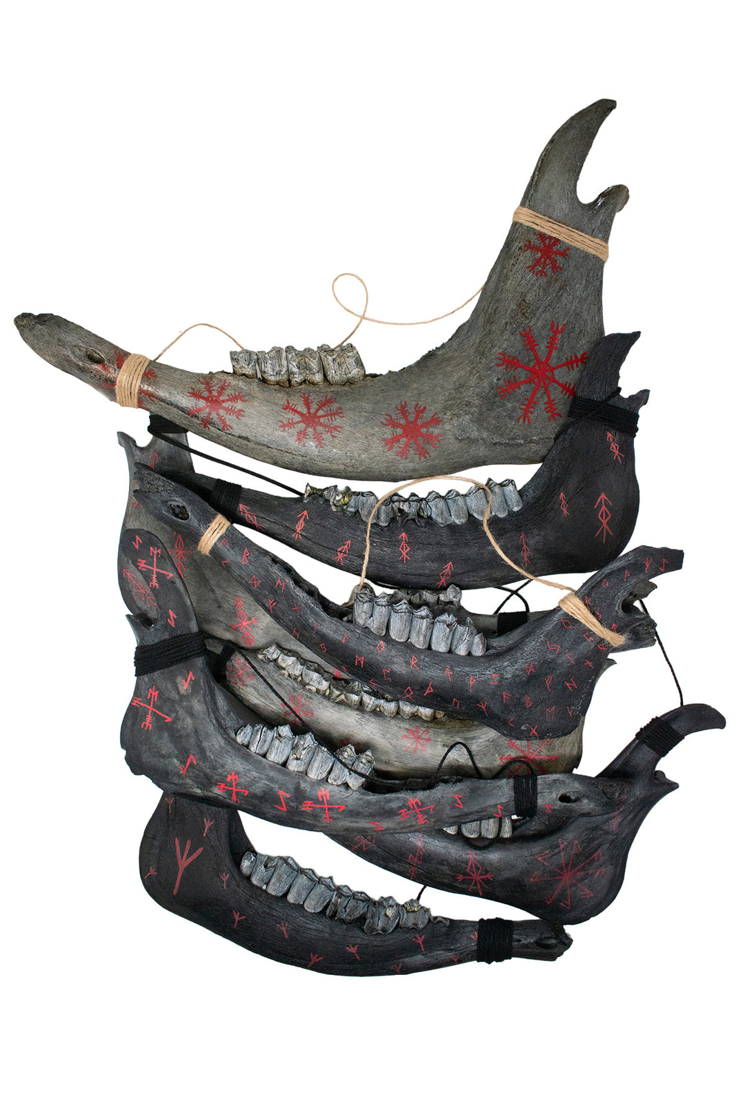 blackened elk and cow jawbone talismans