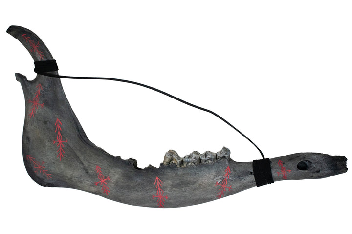blackened elk and cow jawbone talismans