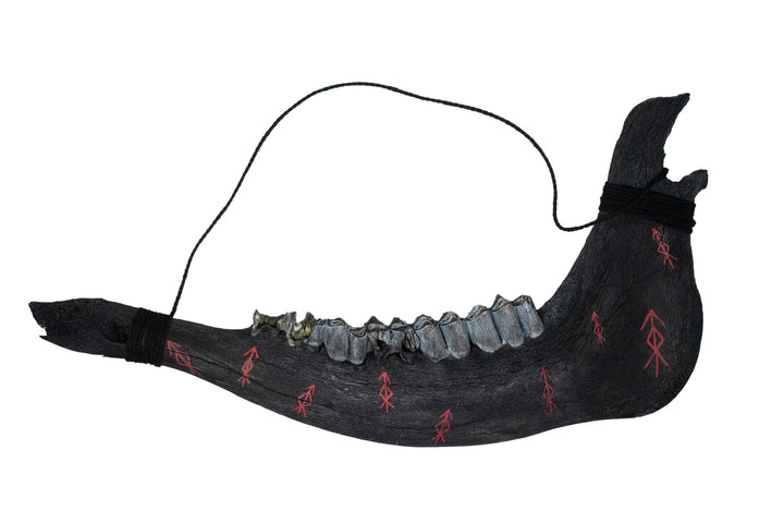 blackened elk and cow jawbone talismans