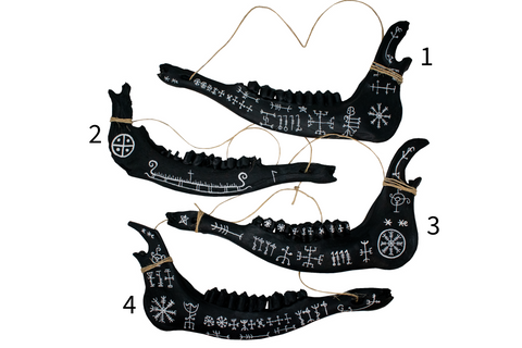 Image of blackened elk jawbone hanger